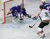 Goalie Andrej Hocevar (no.1) of Slovenia trying to save his goal during match of IIHF Division 1 World championships between Slovenia and Hungary. Match was won by Slovenia who defeated Hungary with 4:1. Match was played in Tivoli Arena in Ljubljana, Slovenia on 16th of April 2007.
