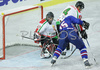 Egon Muric (no.15) of Slovenia (R) scoring next to Andras Horvath (no.4) of Hungary (M) and Levente Szuper (no.30) of Hungary (L) during match of IIHF Division 1 World championships between Slovenia and Hungary. Match was won by Slovenia who defeated Hungary with 4:1. Match was played in Tivoli Arena in Ljubljana, Slovenia on 16th of April 2007.
