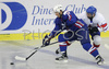 Milan Hafner (no.16) of Slovenia escaping defenders of Great Britain during match of IIHF Division 1 World championships between Slovenia and Great Britain. Match was won by Slovenia who defeated Great Britain with 4:0. Match was played in Tivoli Arena in Ljubljana, Slovenia on 18th of April 2007.

