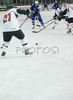 Egon Muric (no.15) of Slovenia (M) shooting on goal between Chris Yule (no.21) of Japan (L) and Masahito Nishiwaki (no.11) of Japan (R) during match of IIHF Division 1 World championships between Slovenia and Japan. Match was won by Slovenia who defeated Japan with 7:1. Match was played in Tivoli Arena in Ljubljana, Slovenia on 19th of April 2007.
