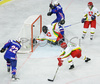 Marcel Rodman (no.22) of Slovenia shooting on goal during match of IIHF Division 1 World championships between Slovenia and Lithuania. Match was won by Slovenia who defeated Lithuania with 4:2. Match was played in Tivoli Arena in Ljubljana, Slovenia on 21. of April 2007.
