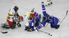 David Rodman (no.12) of Slovenia (R), Egon Muric (no.15) of Slovenia (2nd from R),  Mindaugas Kieras (no.3) of Lithuania (2nd from L) and goalie Nerijus Dauksevicius (no.30) of Lithuania (L) during match of IIHF Division 1 World championships between Slovenia and Lithuania. Match was won by Slovenia who defeated Lithuania with 4:2. Match was played in Tivoli Arena in Ljubljana, Slovenia on 21. of April 2007.
