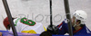 Anze Terlikar (no.24) of Slovenia (R) and Arturas Katulis (no.6) of Lithuania on side of field during match of IIHF Division 1 World championships between Slovenia and Lithuania. Match was won by Slovenia who defeated Lithuania with 4:2. Match was played in Tivoli Arena in Ljubljana, Slovenia on 21. of April 2007.
