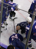Anze Terlikar (no.24) of Slovenia injured after hitting wall during match of IIHF Division 1 World championships between Slovenia and Lithuania. Match was won by Slovenia who defeated Lithuania with 4:2. Match was played in Tivoli Arena in Ljubljana, Slovenia on 21. of April 2007.
