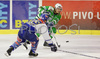 Pasi Petrilainen (no.20) of ZM Olimpija (R) passing by Gert Acker (no.23) of EC VSV (L) during match of 26th round of EBEL League between ZM Olimpija, Ljubljana, Slovenia and EC VSV, Villach, Austria. Match was won by EC VSV who defeated ZM Olimpija with 1:3. Match was played in Tivoli Arena in Ljubljana, Slovenia on 30th of November 2007.
