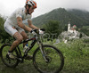 Borut Fonda of Sd Energija (Juniors) competing during 6th race of Slovene cup in cross country MTB race which was held in Kamnik, Slovenia. Due to week long rain track was wet and full of mud which made racing even more demanding. Women elite, women under 23, men juniors and men masters categories had to finish 5 laps long race, while men elite and men under23 had race long 7 laps.
