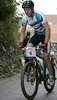 Matej Lovse of Kd Hrastnik (Elite) competing during 6th race of Slovene cup in cross country MTB race which was held in Kamnik, Slovenia. Due to week long rain track was wet and full of mud which made racing even more demanding. Women elite, women under 23, men juniors and men masters categories had to finish 5 laps long race, while men elite and men under23 had race long 7 laps.

