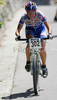 Nina Homovec of MBK Hidria riding during Slovene Women, Junior and Amaters National Championships in Cross country mountain biking. XC MTB National Championship was held in period of extreme heat where temperatures reached up to +35c, in Kamnik, Slovenia on 22nd of July 2007.
