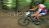 Cyclists riding during Slovene Women, Junior and Amaters National Championships in Cross country mountain biking. XC MTB National Championship was held in period of extreme heat where temperatures reached up to +35c, in Kamnik, Slovenia on 22nd of July 2007.
