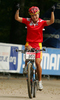 Winner in U23 category and fifth overall Ren Chengyuan of China celebrating her run in finish of last race of Women cross country (XCO) Nissan UCI Mountain Bike World Cup. Final race of MTB World Cup was held in Maribor, Slovenia, on 15th of September 2007.
