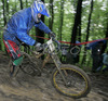 Miha Jakopic of SKTD Avce riding during final run of Slovene Cup race in MTB Downhill Kamnik 2006, which was held in Kamnik, Slovenia. Racing was done in extreme conditions caused by heavy rainfall on race day which turned downhill track into mud bath for riders and spectators.
