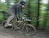 Rok Jurca of MTB Sokol Fun Sports riding during final run of Slovene Cup race in MTB Downhill Kamnik 2006, which was held in Kamnik, Slovenia. Racing was done in extreme conditions caused by heavy rainfall on race day which turned downhill track into mud bath for riders and spectators.
