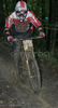 Bostjan Volf of RSP Racing Snurfclub riding during final run of Slovene Cup race in MTB Downhill Kamnik 2006, which was held in Kamnik, Slovenia. Racing was done in extreme conditions caused by heavy rainfall on race day which turned downhill track into mud bath for riders and spectators.
