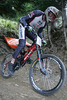 Ziga Zivoder of MTB Trbovlje Cult riding at Specialized Downhill Crni Vrh 2006 which was held at Crni vrh nad Idrijo, Slovenia on 20th of August 2006. Race also counted as Slovenian cup in MTB Downhill cycling for season 2006.
