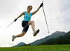 Nordic walker is enjoying her sport on fields near village Preddvor, Slovenia, on nice late spring afternoon. Nordic walking was first used as a summer training method by cross-country skiers. Nordic walking is one of the fastest growing recreational fitness sports in the world. Nordic walking is fitness walking with specially designed nordic walker poles and offers a very efficient, aerobic and easy way to improve your physical condition irrespective of age, sex or physical condition.
