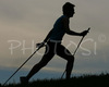 Nordic walker is enjoying her sport on fields near village Preddvor, Slovenia, on nice late spring afternoon. Nordic walking was first used as a summer training method by cross-country skiers. Nordic walking is one of the fastest growing recreational fitness sports in the world. Nordic walking is fitness walking with specially designed nordic walker poles and offers a very efficient, aerobic and easy way to improve your physical condition irrespective of age, sex or physical condition.
