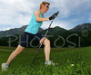 Nordic walker is enjoying her sport on fields near village Preddvor, Slovenia, on nice late spring afternoon. Nordic walking was first used as a summer training method by cross-country skiers. Nordic walking is one of the fastest growing recreational fitness sports in the world. Nordic walking is fitness walking with specially designed nordic walker poles and offers a very efficient, aerobic and easy way to improve your physical condition irrespective of age, sex or physical condition.
