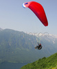 Paragliders are taking off on slopes of Vogar above Bohinj, Slovenia. Planina Vogar (Meadows of Vogar) is among most popular paragliders places and is laying about 500 meters above Bohinj and Bohinj lake.
