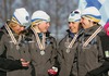Second placed relay team of Sweden with members Emma Bergman, Anna Simberg, Anna Hansson and Charlotte Kalla are celebrating their silver medals won in 4x3.3km Junior Women relay race of FIS Nordic Junior Ski World Championships which was held in Medvode, Slovenia on 5.February 2006.
