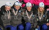 Second placed relay team of Sweden with members Emma Bergman, Anna Simberg, Anna Hansson and Charlotte Kalla are celebrating their silver medals won in 4x3.3km Junior Women relay race of FIS Nordic Junior Ski World Championships which was held in Medvode, Slovenia on 5.February 2006.
