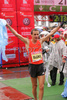 Winner Oleksandr Sitkovskiy of Ukrain celebrating his victory in finish of 12th Ljubljana Marathon. 12th Ljubljana Marathon was held in Ljubljana, Slovenia, on 28th of October 2007. Marathon was held in difficult cold and rainy weather, so already hard track was even harder for more then 8000 runners who were competing in this years marathon and half marathon.
