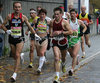 Roman Kejzar of Slovenia (L) was pacing Helena Javornik of Slovenia (M) to her second place in 12th Ljubljana Marathon. 12th Ljubljana Marathon was held in Ljubljana, Slovenia, on 28th of October 2007. Marathon was held in difficult cold and rainy weather, so already hard track was even harder for more then 8000 runners who were competing in this years marathon and half marathon.
