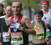 Roman Kejzar of Slovenia (L) was pacing Helena Javornik of Slovenia (R) to her second place in 12th Ljubljana Marathon. 12th Ljubljana Marathon was held in Ljubljana, Slovenia, on 28th of October 2007. Marathon was held in difficult cold and rainy weather, so already hard track was even harder for more then 8000 runners who were competing in this years marathon and half marathon.
