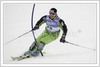 Mitja Kunc of Slovenia skiing last slalom as forerunner before second run of slalom race of Audi FIS Alpine skiing world cup in Kranjska Gora, Slovenia.  Race was won by Giogio Rocca of Italy, Andre Myhrer of Sweden placed second and Benjamin Raich of Austria finished third. <br> 
