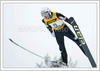Jernej Damjan of Slovenia flying through the air on FIS World Cup Ski Jumping in Planica, Slovenia.

