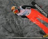 Sabastien Cala of Switzerland soars through the air during Junior ski jumping team race of FIS Nordic Junior Ski World Championships. Race was won by Austria, Slovenia placed second, while Japan finished third.
