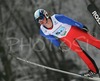 Trevor Wert of USA soars through the air during Junior ski jumping team race of FIS Nordic Junior Ski World Championships. Race was won by Austria, Slovenia placed second, while Japan finished third.

