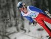 Trevor Wert of USA soars through the air during Junior ski jumping team race of FIS Nordic Junior Ski World Championships. Race was won by Austria, Slovenia placed second, while Japan finished third.
