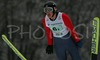 Mike Glasder of USA soars through the air during Junior ski jumping team race of FIS Nordic Junior Ski World Championships. Race was won by Austria, Slovenia placed second, while Japan finished third.
