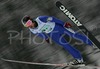 Yuhei Sasaki of Japan soars through the air during Junior ski jumping team race of FIS Nordic Junior Ski World Championships. Race was won by Austria, Slovenia placed second, while Japan finished third.
