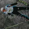 Jurij Tepes of Slovenia soars through the air during Junior ski jumping team race of FIS Nordic Junior Ski World Championships. Race was won by Austria, Slovenia placed second, while Japan finished third.
