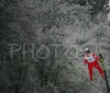 Robert Hrgota of Slovenia soars through the air during Junior ski jumping team race of FIS Nordic Junior Ski World Championships. Race was won by Austria, Slovenia placed second, while Japan finished third.
