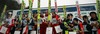 Winning team of Austria with members Arthur Pauli, Thomas Thurnbichler, Mario Innauer and Gregor Sclierenzauner (M), second placed team Slovenia with members Jernej Kosnjek, Primoz Roglic, Jurij Tepes and Robert Hrgota (L() and third placed team Japan with members Naoya Toyama, Yuhei Sasaki, Shohei Tochimoto and Kenshiro Ito (R) are celebrating their medals  in Junior ski jumping team race of FIS Nordic Junior Ski World Championships.

