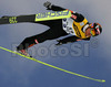 World record holder Bjoern Einar Romoeren of Norway soars through the air during qualification jump for Saturdays e.on Ruhrgas FIS Ski Jumping World Cup finals. Qualifications were held in Planica, Slovenia on 17.March 2006. 15 best placed ski jumpers in World Cup are automaticaly qualified for competition while next 25 ski jumpers needs to qualify for main competition through qualification jump.
