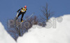 Henning Stensrud of Norway soars through the air during e.on Ruhrgas FIS Ski Jumping World Cup finals. First race of FIS Ski Jumping World Cup finals was held in Planica, Slovenia on 18.March 2006.
