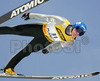 Matti Hautamaeki of Finland soars through the air during e.on Ruhrgas FIS Ski Jumping World Cup finals. First race of FIS Ski Jumping World Cup finals was held in Planica, Slovenia on 18.March 2006.
