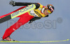 Winner Bjoern Einar Romoeren of Norway soars through the air during e.on Ruhrgas FIS Ski Jumping World Cup finals. First race of FIS Ski Jumping World Cup finals was held in Planica, Slovenia on 18.March 2006.
