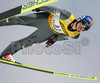 Thomas Morgenstern of Austria soars through the air during e.on Ruhrgas FIS Ski Jumping World Cup finals. First race of FIS Ski Jumping World Cup finals was held in Planica, Slovenia on 18.March 2006.
