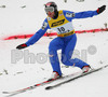 Andreas Widhoelzl of Austria lands at 217.5 meters in second jump of e.on Ruhrgas FIS Ski Jumping World Cup finals. First race of FIS Ski Jumping World Cup finals was held in Planica, Slovenia on 18.March 2006.
