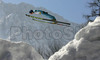 Winner Janne Happonen of Finland soars through the air during trial jump for last race of e.on Ruhrgas FIS Ski Jumping World Cup finals. Last race of e.on Ruhrgas FIS Ski Jumping World Cup was held in Planica, Slovenia on 19.March 2006.
