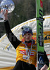 Overall World Cup winner Jakub Janda of Czech celebrating his victory with Overall world cup trophy after last race of e.on Ruhrgas FIS Ski Jumping World Cup which was held in Planica, Slovenia on 19.March 2006.
