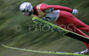 Wolgang Loutzl of Austria soars through the air during qualification jump for tomorrows Summer FIS Grand Prix in ski jumping Kranj 2006. Qualifications were held in Ski jumping center in Kranj, Slovenia on 1. September 2006. First 50 ski jumpers qualified for tomorrow Summer FIS Grand Prix in ski jumping Kranj 2006, which will be held in Kranj, Slovenia on 2. September 2006.
