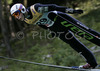 Jurij Tepes of Slovenia soars through the air during qualification jump for tomorrows Summer FIS Grand Prix in ski jumping Kranj 2006. Qualifications were held in Ski jumping center in Kranj, Slovenia on 1. September 2006. First 50 ski jumpers qualified for tomorrow Summer FIS Grand Prix in ski jumping Kranj 2006, which will be held in Kranj, Slovenia on 2. September 2006.
