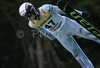 Jernej Damjan of Slovenia soars through the air during qualification jump for tomorrows Summer FIS Grand Prix in ski jumping Kranj 2006. Qualifications were held in Ski jumping center in Kranj, Slovenia on 1. September 2006. First 50 ski jumpers qualified for tomorrow Summer FIS Grand Prix in ski jumping Kranj 2006, which will be held in Kranj, Slovenia on 2. September 2006.
