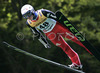 Winner Simon Ammann of Switzerland soars through the air during Summer FIS Grand Prix in ski jumping Kranj 2006. Summer FIS Grand Prix in ski jumping Kranj 2006 was held on 2. of September 2006 in Kranj, Slovenia.
