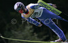 Antonin Hajek of Czech soars through the air during Summer FIS Grand Prix in ski jumping Kranj 2006. Summer FIS Grand Prix in ski jumping Kranj 2006 was held on 2. of September 2006 in Kranj, Slovenia.
